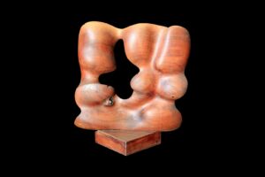 Luigi Sandi: Figura antropomorfa, 1990 - legno - cm 35x40