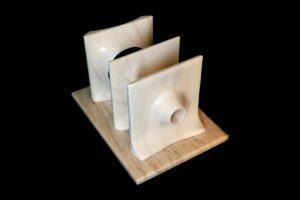 Luigi Sandi: Vuoti comunicanti, 2012 - marmo rosa portogallo - cm 30x30x10